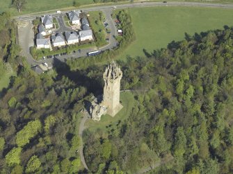 Oblique aerial view centred on the monument, taken from the SE.