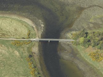 Oblique aerial view centred on the road bridge, taken from the ESE.