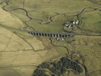 Oblique aerial view centred on viaduct and Shankend Farm, taken from the SW.
