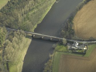 Oblique aerial view centred on Mertoun Bridge, taken from the NW.