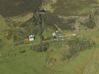 Oblique aerial view centred on the house, taken from the SW.