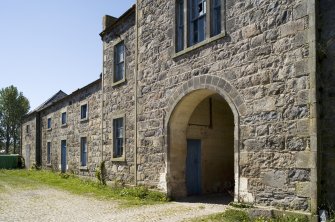 Pend under clock tower and house to  SW, view from NE