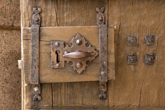 Interior. Detail of wooden lock on SE door