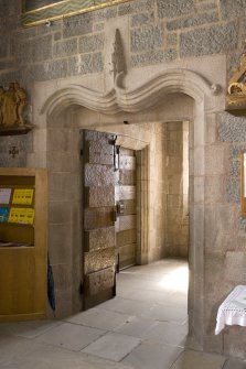 Interior. View of doorway at SE corner