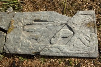 Fragments of west highland grave slab showing figure with spear