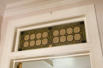 Interior. Ground floor. Access corridor. Typical window light over internal door. Detail