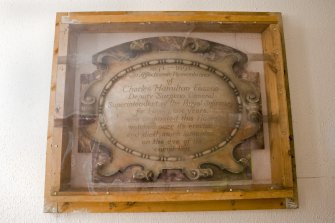 Interior. Ground floor. Access corridor. Commemoration tablet. Detail