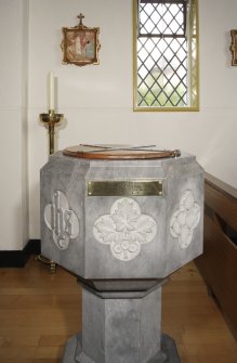 Interior. View of font.