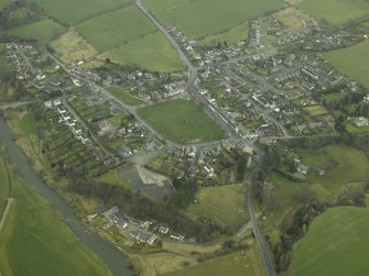 Oblique aerial view centred on village, taken from W.