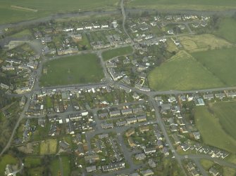 Oblique aerial view centred on the central area of the village, taken from the SE.