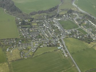 Oblique aerial view centred on village, taken from the E.