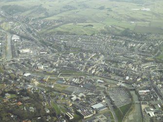 General oblique aerial view centred on town, taken from the NE.