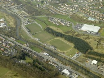 Oblique aerial view centred on Mansfield Park Rugby Ground and Albert Park Football ground, taken from the E.