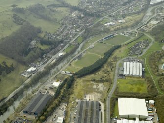 Oblique aerial view centred on Mansfield Park Rugby Ground and Albert Park Football ground, taken from the NE.