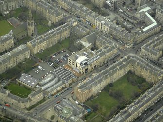 Oblique aerial view centred on 16 Bernard Terrace, taken from the NW.