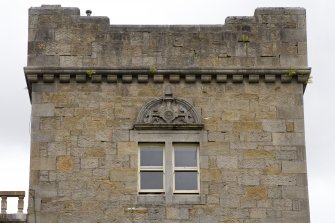 Tower. W side wndow pediment. Detail