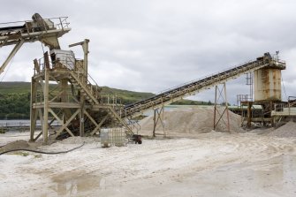 View of Morgenson SIzer and Hazemag crusher (below) at top of Conveyor No. 1,  Conveyor No. 2 and Surge Bin.