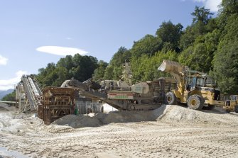 General view from N of temporary portable primary crusher, Vibbro Hopper, Drag Feeder and Conveyors 1 and 2.
