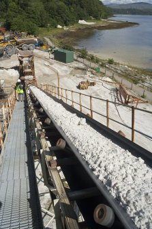 Elevated view from S looking from top of Conveyor No. 1 towards temporary primary crusher and Drag Feeder.