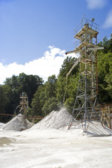 View of Tower Nos. 1 and 2 and processed sand stocks awaiting shipment.