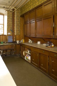 Interior. South wing, ground floor, pantry, view from W