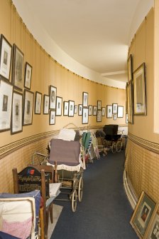 Interior. Main block, ground floor, corridor leading to S wing, view from NE