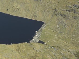 Oblique aerial view centred on the dam, taken from the SW.