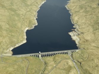 Oblique aerial view centred on the dam, power station and reservoir, taken from the SW.