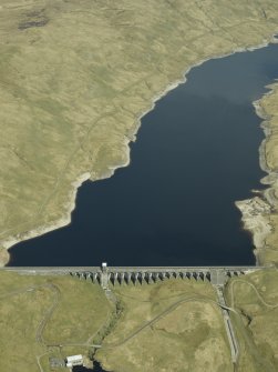 Oblique aerial view centred on the dam, power station and reservoir, taken from the SW.