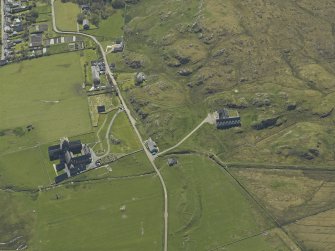 Oblique aerial view of the abbey, the Macleod Centre and the remains of the vallum, taken from the NNE.