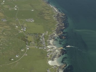 General oblique aerial view of the abbey and village, taken from the SSW.