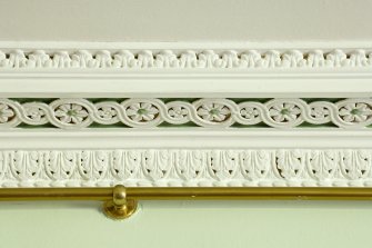 Interior. Upper ground floor. Library. Cornice and brass picture rail. Detail