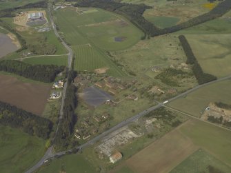 Oblique aerial view centred on the former barracks, taken from the SE.