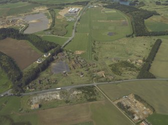 Oblique aerial view centred on the former barracks, taken from the E.