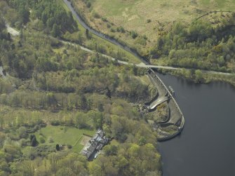 Oblique aerial view centred on the dam with the hotel adjacent, taken from the NE.