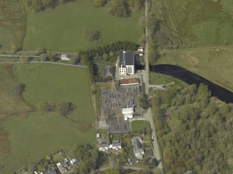 Oblique aerial view centred on the power station, taken from the SSE.