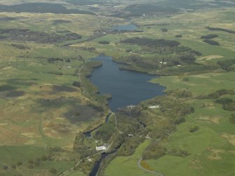 General oblique aerial view centred on the loch with the power station in the middle distance, taken from the S.