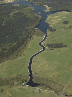 Oblique aerial view centred on the dam and canal, taken from the S.