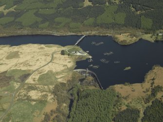 Oblique aerial view centred on the dam, taken from the SSW.