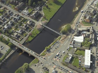 Oblique aerial view centred on the road bridge and suspension bridge, taken from the ESE.