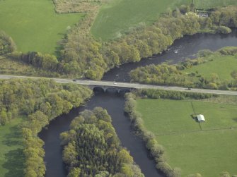 Oblique aerial view centred on the road bridge, taken from the NNW.