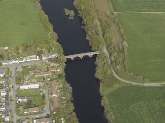 Oblique aerial view centred on the road bridge, taken from the ENE.
