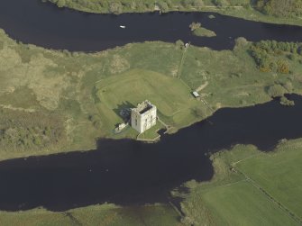 Oblique aerial view centred on the castle, taken from the W.