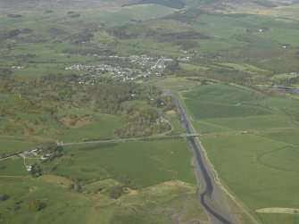 General aerial view looking along the Fleet canal towards the village, taken from the SW.