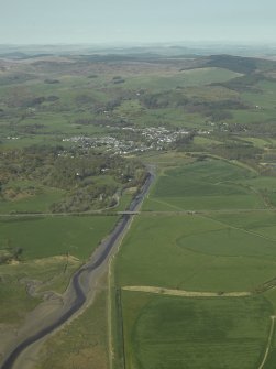 General aerial view looking along the Fleet canal towards the village, taken from the SSW.