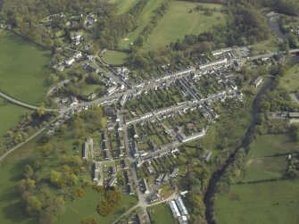 Oblique aerial view centred on the village, taken from the NNW.