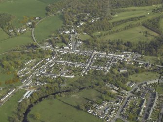 Oblique aerial view centred on the village, taken from the NW.