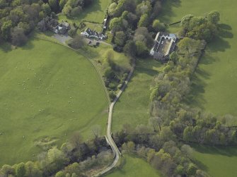 Oblique aerial view of the bridge, steading and country house, taken from the ESE.