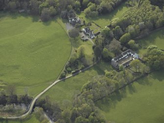 Oblique aerial view of the bridge, steading and country house, taken from the ENE.