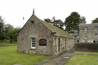 View of chapel block from E